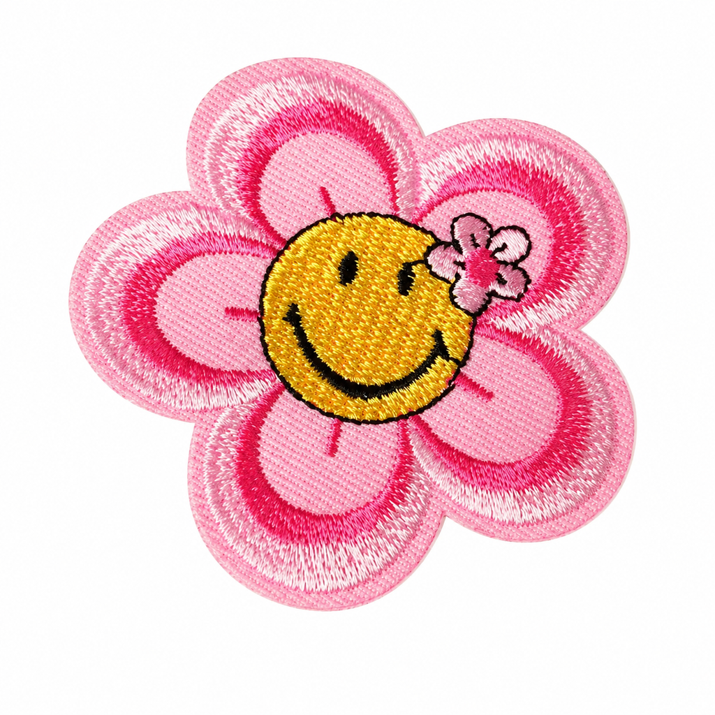 Kukka-smiley roosa/keltainen – silitettävä kangasmerkki
