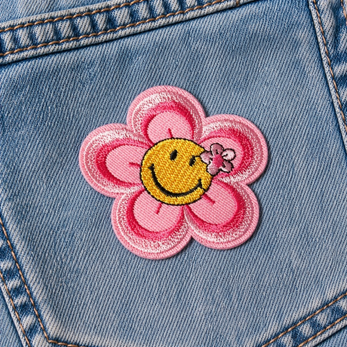 Kukka-smiley roosa/keltainen – silitettävä kangasmerkki